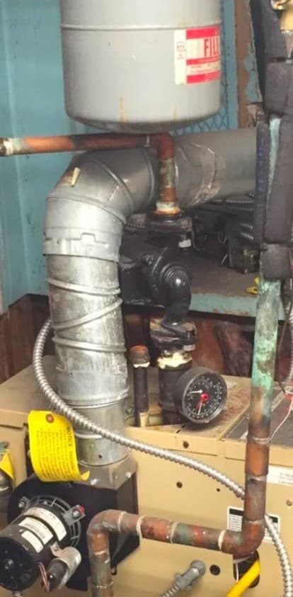 picture of a plumber installing plumbing fixtures